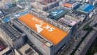 The SK Hynix Inc. logo is displayed atop the company's semiconductor plant in this aerial photograph taken above Icheon, South Korea, on Monday, July 22, 2019. SK Hynix is scheduled to release earnings figures on July 25. Photographer: SeongJoon Cho/Bloomberg