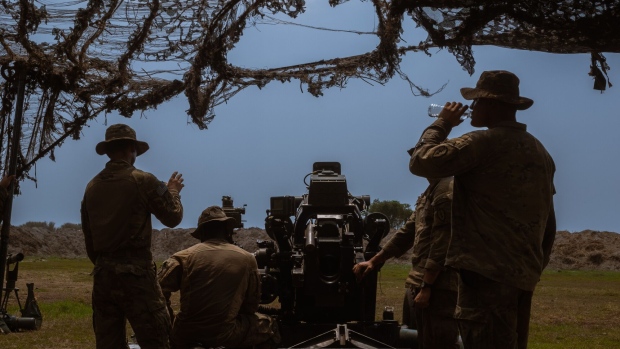SAN ANTONIO, PHILIPPINES - APRIL 26: Members of the 2-11FA Alpha Battery inspects a 105mm cannon that fired rounds during a live fire drill by combined forces of the United States and Philippines military on April 26, 2023 at the Naval Education Training and Doctrine Command (NETDC) in San Antonio, Zambales, Philippines. The live fire drill is part of the annual US-Philippines drills called Balikatan, meaning "shoulder to shoulder" in Tagalog, which will involve more than 17,000 military personnel and are scheduled to end on April 28th. (Photo by Jes Aznar/Getty Images)