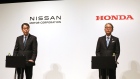 Nissan’s Makoto Uchida, left, and Honda’s Toshihiro Mibe during a news conference on March 15.