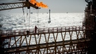 A gas flare burns from a pipe aboard an offshore oil platform in the Persian Gulf's Salman Oil Field, operated by the National Iranian Offshore Oil Co., near Lavan island, Iran, on Thursday, Jan. 5. 2017. Nov. 5 is the day when sweeping U.S. sanctions on Iran’s energy and banking sectors go back into effect after Trump’s decision in May to walk away from the six-nation deal with Iran that suspended them. Photographer: Ali Mohammadi/Bloomberg
