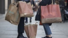 Shoppers with Primark bags in London.