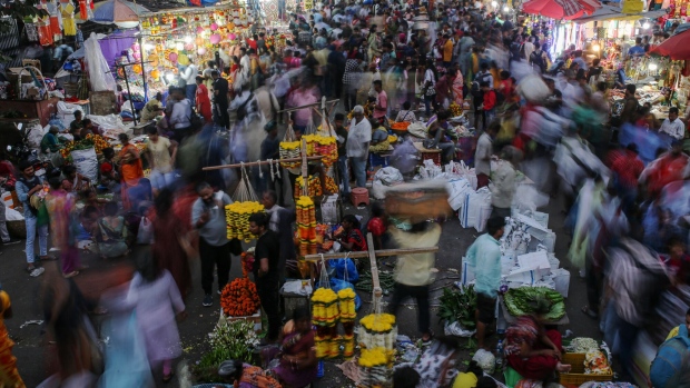 <p>Shoppers at the Dadar market in Mumbai.</p>