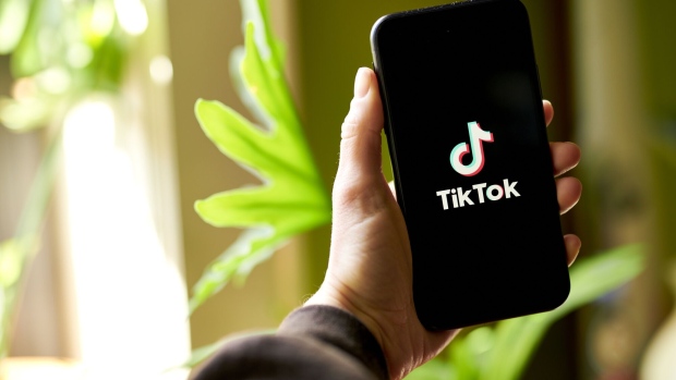 The TikTok logo on a smartphone arranged in the Brooklyn borough of New York, US, on Thursday, March 9, 2023. The US is moving closer to restricting access to the popular video-sharing app TikTok, with Senate Intelligence Committee Chairman Mark Warner set to unveil a bill Tuesday that the Biden administration is poised to support, according to people familiar with the issue.