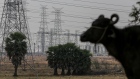 Power lines and transmission towers at the site for Pharma City in Hyderabad, India, on Tuesday, March 22, 2022. On the edge of Hyderabad in southern India, a vast patch of arid shrub-land the size of about 14,000 football fields is becoming a testing ground for a model that could help wean the world off its dependence on Chinese drug ingredients. Photographer: Dhiraj Singh/Bloomberg