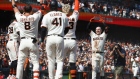 <p>San Francisco Giants celebrate during a game against the Texas Rangers in San Francisco on August 13.</p>