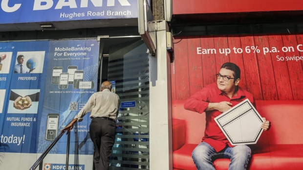 An advertisement for Kotak Mahindra Bank Ltd. in Mumbai. Photographer: Dhiraj Singh/Bloomberg