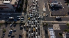 <p>Vehicles approach the Holland Tunnel in Jersey City, New Jersey.</p>