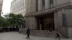 <p>People walk in front of the Daniel Patrick Moynihan US Courthouse in New York City. </p>