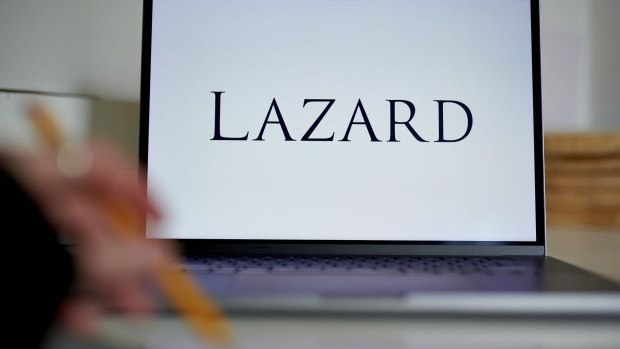 The Lazard logo on a laptop computer arranged in the Brooklyn borough of New York, US, on Friday, April 28, 2023. Lazard Ltd. posted a surprise loss for the first quarter and said it plans to reduce its workforce by 10% this year, predicting the industrys dealmaking slump will last through 2023.