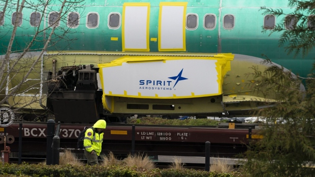 <p>Spirit AeroSystems signage on a Boeing 737 fuselage outside the Boeing manufacturing facility in Renton, Washington.</p>