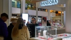 Shoppers purchase Pandora jewelry at in New York. Photographer: Bing Guan/Bloomberg