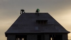 Workers at a home under construction in Vaughan, Canada, on Tuesday, Dec. 20. 2022. Canadian home prices fell for a ninth straight month as sharply rising interest rates prompted both buyers and sellers to withdraw from the market heading into the traditionally slower winter season. Photographer: Cole Burston/Bloomberg