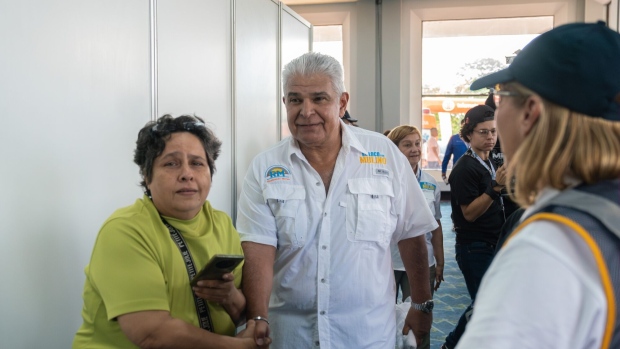 Jose Raul Mulino, center, arrives to cast a ballot at a polling station during the general election in Panama City on May 5.