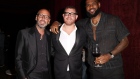 Alex Pirez, Jeff Zalaznick and LeBron James at Carbone Beach on May 4 in Miami Beach.  Photographer: Alexander Tamargo/Getty Images North America
