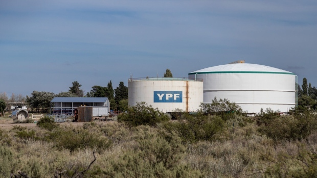 <p>Storage tanks at a YPF SA facility.</p>