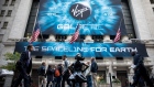 Pedestrians pass in front of a banner displaying Virgin Galactic Holdings Inc. signage during the company's initial public offering (IPO) outside the New York Stock Exchange (NYSE) in New York, U.S., on Monday, Oct. 28, 2019. Richard Branson's Virgin Galactic Holdings Inc. became the first space-tourism business to go public as it began trading Monday on the New York Stock Exchange with a market value of about $1 billion. Photographer: Michael Nagle/Bloomberg