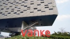 Signage for China Vanke Co. in Shenzhen, China, on Monday, April 15, 2024. Vanke shares rose the most in more than a month after the state-backed builder said it has made plans to resolve liquidity pressure. Photographer: Qilai Shen/Bloomberg