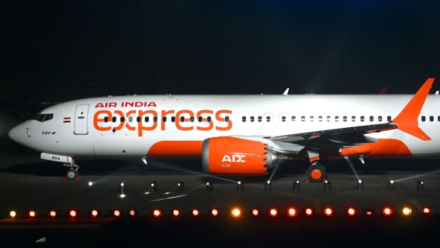 An Air India Express passenger jet. Photographer: Indranil Mukherjee/AFP/Getty Images