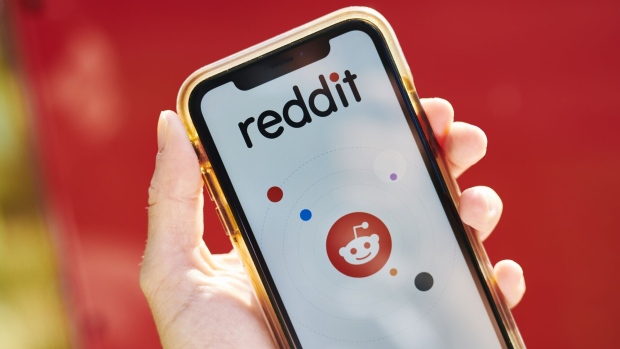 Reddit Inc. signage is displayed on a smartphone in an arranged photograph taken in the Brooklyn borough of New York, U.S., on Tuesday, June 30, 2020. Twitch and Reddit Inc. banned content linked to President Donald Trump for violating their rules against encouraging hate. Photographer: Gabby Jones/Bloomberg