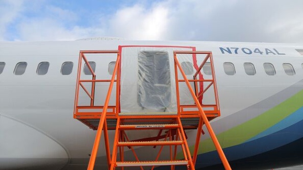 PORTLAND, OREGON - JANUARY 7: In this National Transportation Safety Board (NTSB) handout, plastic covers the exterior of the fuselage plug area of Alaska Airlines Flight 1282 Boeing 737-9 MAX on January 7, 2024 in Portland, Oregon. A door-sized section near the rear of the Boeing 737-9 MAX plane blew off 10 minutes after Alaska Airlines Flight 1282 took off from Portland, Oregon on January 5 on its way to Ontario, California. (Photo by NTSB via Getty Images)