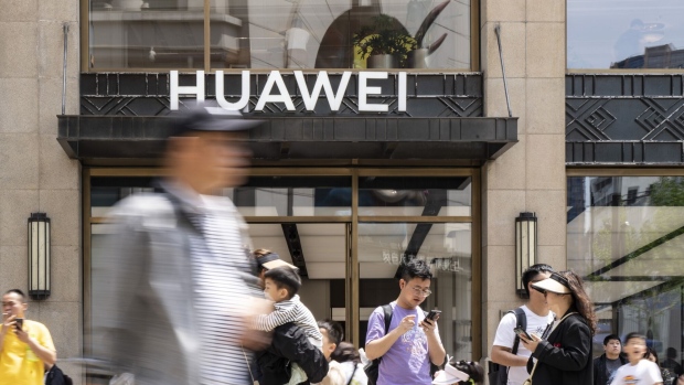 A Huawei Technologies Co. store in Shanghai, China, on Friday, May 3, 2024. Huawei, the Chinese telecommunications giant blacklisted by the US, is secretly funding cutting-edge research at American universities including Harvard through an independent Washington-based foundation. Photographer: Qilai Shen/Bloomberg