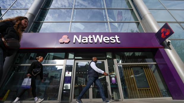 A NatWest Group Plc bank branch in the City of London, UK, on Thursday, Feb. 15, 2024. NatWest Group Plc’s outlook for margins and any estimated impact from the Financial Conduct Authority’s ongoing review of historic car finance loan arrangements will be in focus as it reports fourth-quarter results on Feb. 16. Photographer: Hollie Adams/Bloomberg