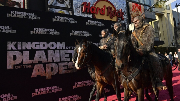 Performers in ape costumes ride horses during the world premiere of 20th Century Fox Studios' "Kingdom of the Planet of the Apes" at the TCL Chinese Theatre in Hollywood, California on May 2, 2024. Photographer: Valerie Macon/AFP/Getty Images