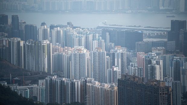 Residential buildings in Hong Kong, China, on Sunday, Feb. 25, 2024. Hong Kong's influential developer association and politicians are putting pressure on the government to remove extra property taxes to lift the lackluster market. Photographer: Lam Yik/Bloomberg