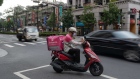 <p>A Foodpanda delivery driver in Taipei.</p>
