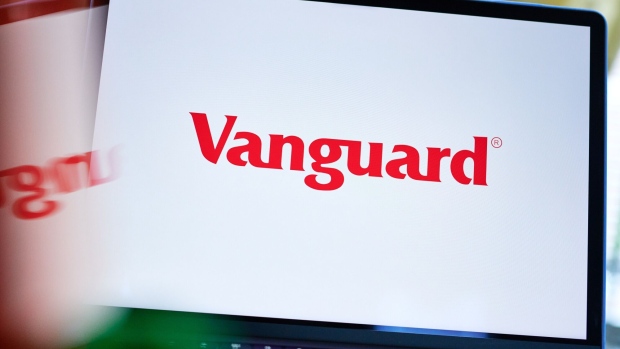 The Vanguard Group logo on a laptop computer arranged in New York, US, on Wednesday, Nov. 8, 2023. Vanguard Group Inc. is planning its first active exchange-traded funds in two years, with both new planned products focused on the fixed-income market. Photographer: Gabby Jones/Bloomberg
