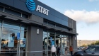 <p>Customers at an AT&T store in Daly City, California.</p>
