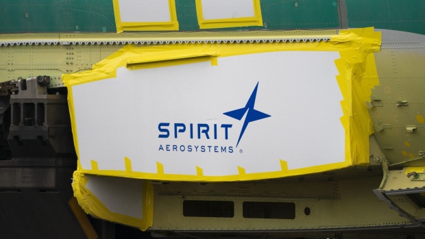 Spirit AeroSystems Holdings Inc. signage on a Boeing 737 fuselage outside the Boeing Co. manufacturing facility in Renton, Washington, US, on Monday, Feb. 5, 2024. Boeing Co. found more mistakes with holes drilled in the fuselage of its 737 Max jet, a setback that could further slow deliveries on a critical program already restricted by regulators over quality lapses. Photographer: David Ryder/Bloomberg