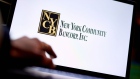 The New York Community Bank (NYCB) logo arranged on a laptop in New York, US, on Thursday, March 7, 2024. Commercial real estate lender New York Community Bancorp received an equity investment of more than $1 billion, gaining a vote of confidence in the struggling lender from investors including former US Treasury Secretary Steven Mnuchin. Photographer: Gabby Jones/Bloomberg