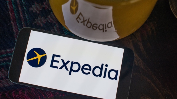 The Expedia logo on a smartphone arranged in Hastings-on-Hudson, New York, US, on Monday, July 31, 2023. Expedia Group Inc. is scheduled to release earnings figures on August 3. Photographer: Tiffany Hagler-Geard/Bloomberg