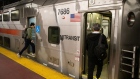 <p>Commuters board a New Jersey Transit train at Pennsylvania Station in New York. </p>