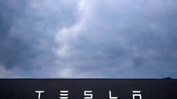 The Tesla Inc. logo on their plant in Gruenheide, Germany, on Sunday, March 10, 2024. Tesla's German factory has long experienced pushback from disgruntled locals and environmental groups. Photographer: Krisztian Bocsi/Bloomberg
