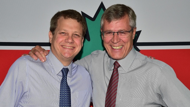 Canadian Tire CEO Michael Medline (left) with his predecessor Stephen Wetmore in 2014