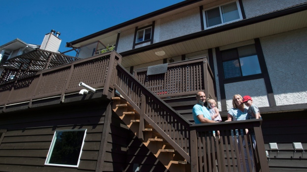 This Coquitlam family say B.C.'s new tax on foreign buyers made the sale of their home fall through.
