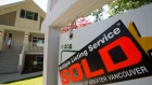 A sold sign is pictured outside a home in Vancouver, B.C.