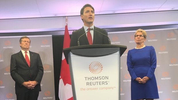 Prime Minister Justin Trudeau with Toronto Mayor John Tory and Ontario Premier Kathleen Wynne