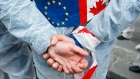 A protester against the EU trade deal with Canada, known as CETA