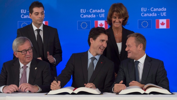 PM Justin Trudeau with Jean-Claude Juncker (left) and Donald Tusk (right)
