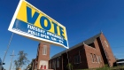 A get out the vote sign is shown outside St. Matthew Missionary Baptist Church in Detroit
