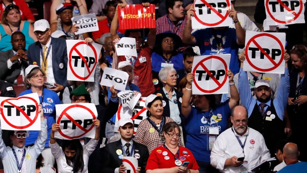 Demonstrators protest against the TPP at the Democratic National Convention in July