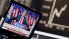 U.S. President Donald Trump on a TV screen at the stock market in Frankfurt, Germany