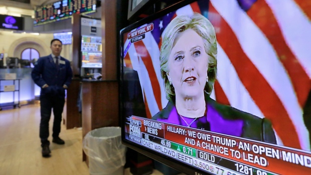 Democratic presidential candidate Hillary Clinton's speech on a TV screen at the NYSE