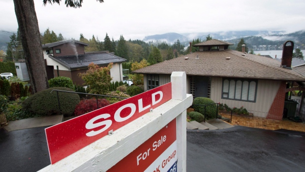 A sold sign is seen outside a home in North Vancouver, B.C. 