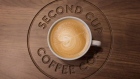 A cup of flat white coffee at a Second Cup Coffee outlet in Toronto