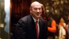 Goldman Sachs COO Gary Cohn gets on an elevator for a meeting at Trump Tower