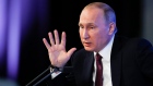 Russian President Vladimir Putin gestures during his annual news conference in Moscow, Russia